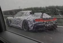 2027 Xiaomi two-door sports car prototype - road